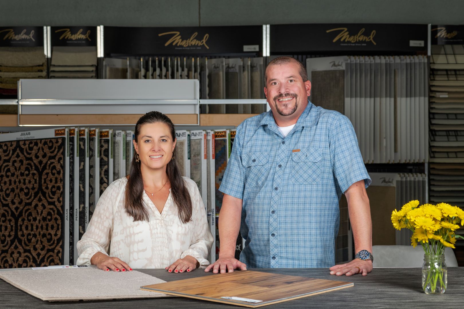 Kelly and Scott in their Carpet One showroom